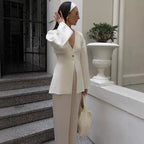 V-Neck, Buckle Closure, and Slit Detail