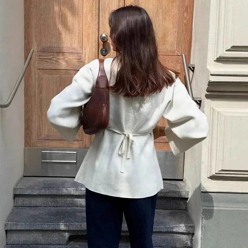V-Neck, Buckle Closure, and Slit Detail