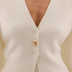 V-Neck, Buckle Closure, and Slit Detail